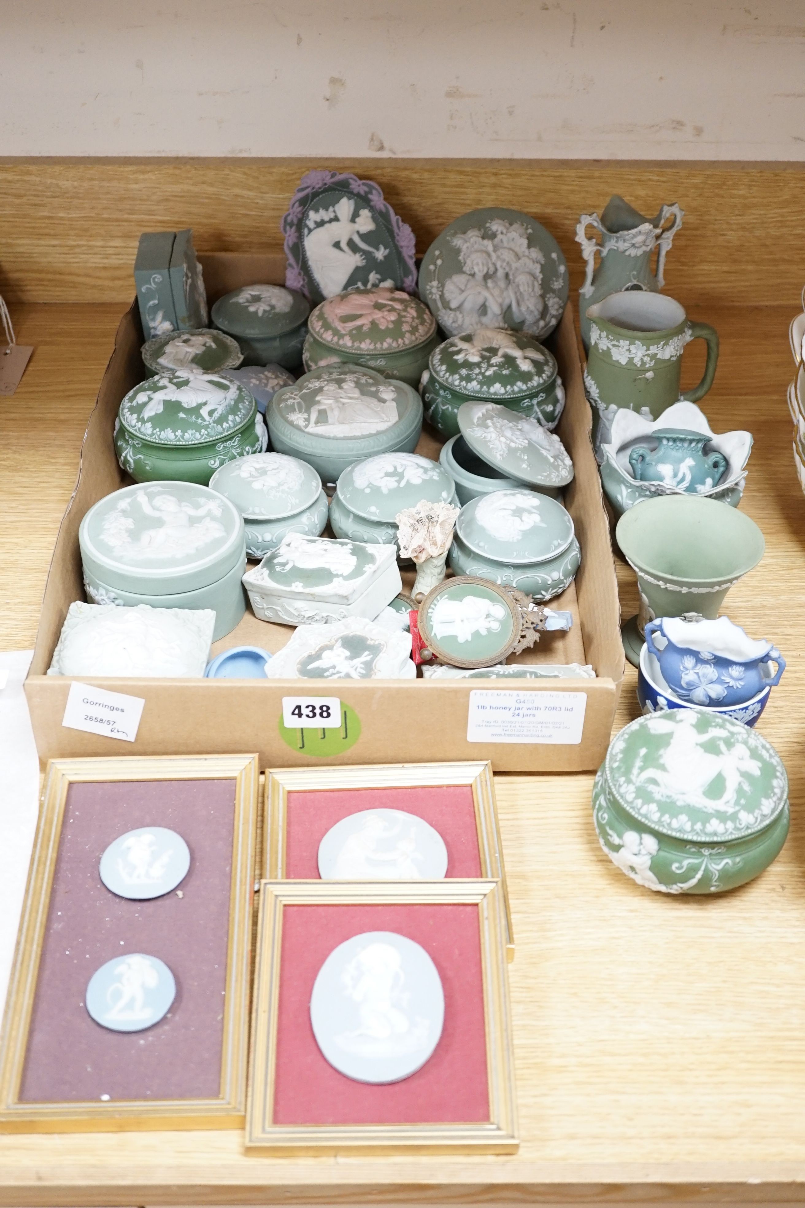 A collection of French bisque boxes and vases.